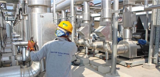 EGTS technician working on chilled water pipework